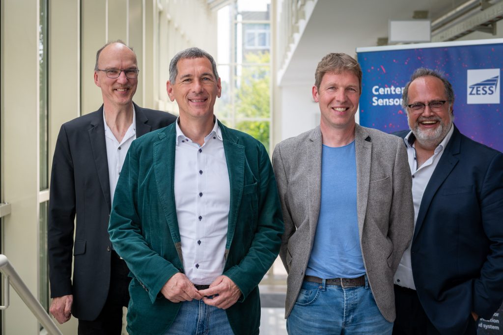 Jens Kamieth, MdL visiting ZESS with Prof Andreas Kolb (Vice Rector for Research, Infrastructure and Collaboration), Prof Kristof Van Laerhoven (Spokesperson ZESS) and Prof Peter Haring Bolívar (ZESS member and coordinator INCYTE)