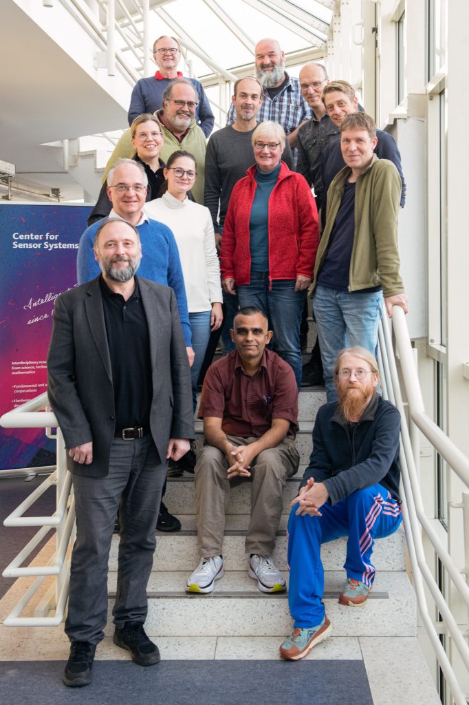 ZESS Members meeting at ZESS, University of Siegen on 4 November 2025. Back to front, left to right: Prof Thomas Seeger, Peter Hof, Prof Peter Haring Bolívar, Dr Holger Nies, Prof Andreas Kolb, Prof Michael Möller, Prof Jasmin Grosinger, Jun-Prof Jovita Lukasik, Prof Klaudia Witte, Prof Kristof Van Laerhoven, Prof Thorsten Raasch, Prof Bhaskar Choubey, Prof Ivo Ihrke and ZESS spokesperson Prof Peter Kraemer [Photo: Jan Söhlke/ZESS]