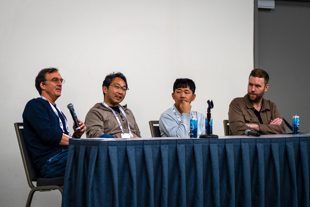 Michael Brown (York University and Samsung AI), Daisuke Iso (Senior Researcher at Sony AI), Hyung-Sin Kim (Seoul National University), and L2S Mercator Fellow Felix Heide (Princeton University) during the L2S workshop at NeurIPS 2025. [Photo: Marius Bock/ZESS]